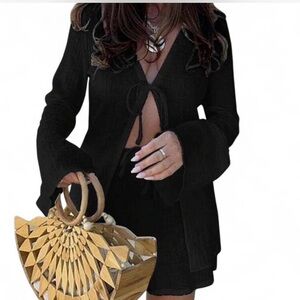 Black two piece set. Long flare sleeve tie top with shorts